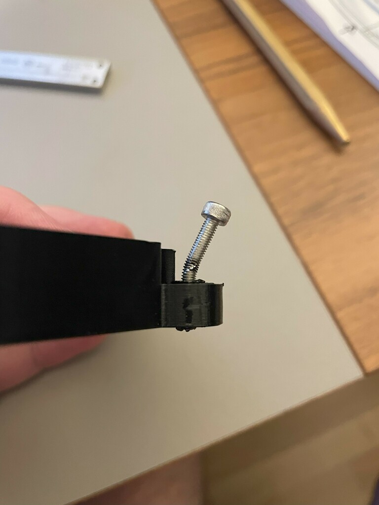 The screw got stuck in the brass insert and got bent when I tried to get it out.
